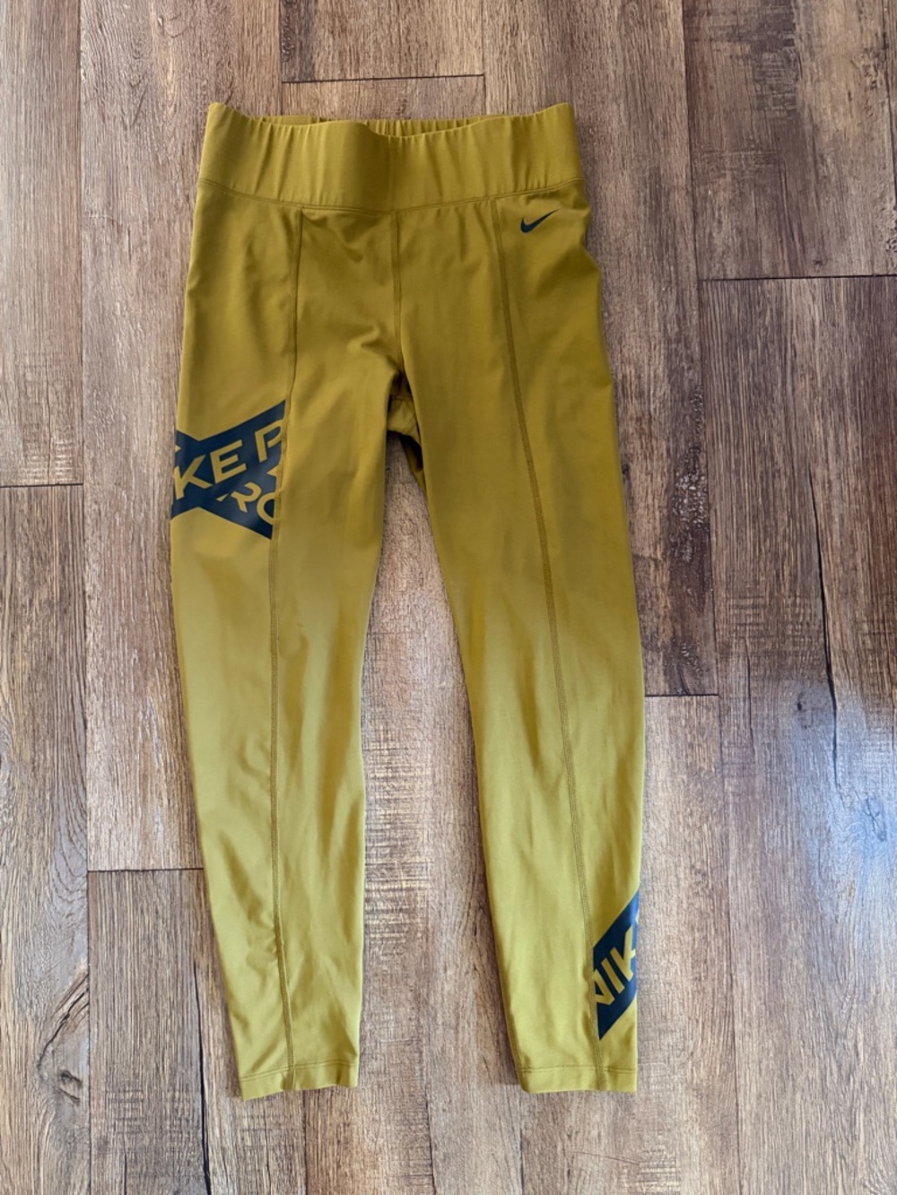 Nike Olive Green Leggings with Black Graphic Accents